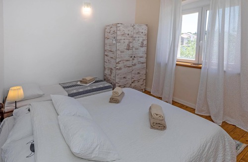 Ploce House | Look forward to a sunny semi-detached house with barbecue and large open terrace.