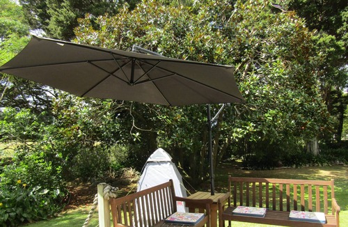 Kaipara Flats Cabin | Looking for a glamping experience with a difference? Try the Magnolia Room.