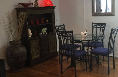 Bellara House | Lorikeets on Boronia