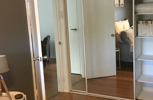 Bellara House | Lorikeets on Boronia