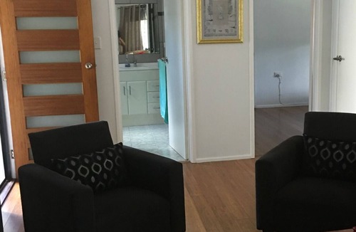 Bellara House | Lorikeets on Boronia