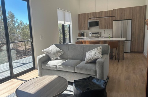 Cedaredge Cottage | Lost Buck Resort - Modern home surrounded by native trees & beautiful view