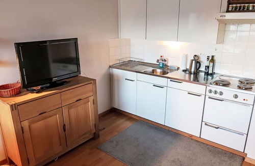 Laax Apartment | Lovely apartment for 3 guests with pool, WIFI, TV, balcony, pets allowed and panoramic view