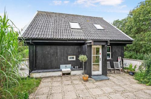 Øer Strand House | Lovely Beach Home Enveloped In Green Surroundings