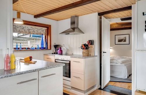 Vesløs House | Lovely cottage with wood-burning stove and water view