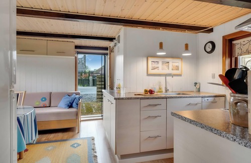 Vesløs House | Lovely cottage with wood-burning stove and water view