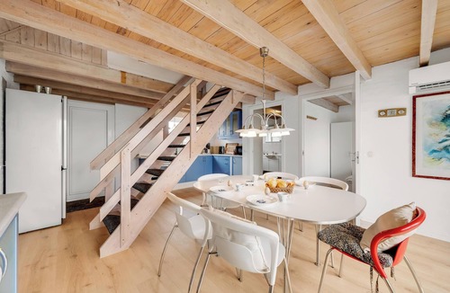 Skjern House | Lovely holiday home with a view of the fishing lake and the fjord.