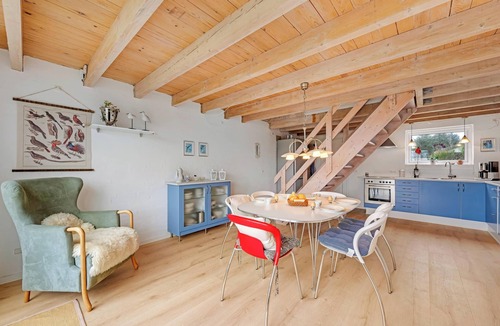 Skjern House | Lovely holiday home with a view of the fishing lake and the fjord.