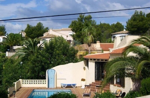 Bernia House | Lovely holiday home with a sun terrace, pool and own garden