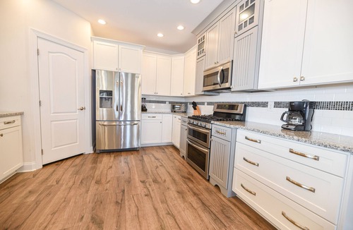 Long Neck House | Lovely home-waterfront, beach, pools, pet friendly!