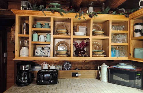 Bradford Cabin | Lovely Log Cabin Retreat: Cozy Fireplace, Beautiful Gardens & Nature