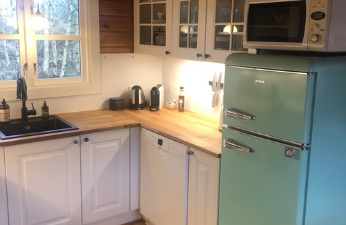 Nordost Cottage | Lovely log house next to protected plantation