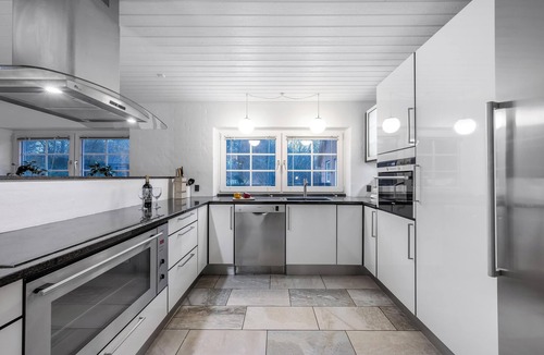 Øhuse House | Lovely pool house with jumping cushion and activity room.