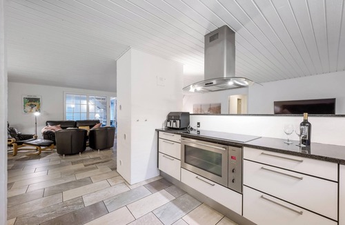 Øhuse House | Lovely pool house with jumping cushion and activity room.