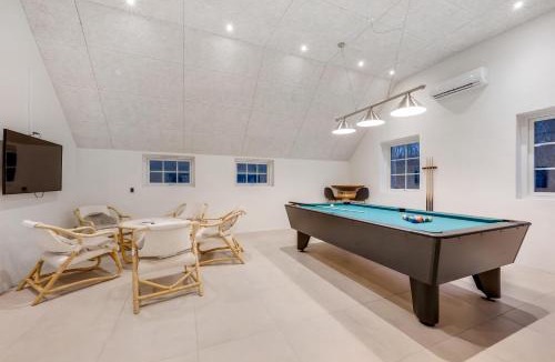 Øhuse House | Lovely Pool House With Jumping Cushion And Activity Room