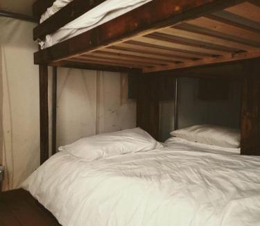 Squires Other | Lovely Safari Tent with Treetop Views for Family Glamping in Missouri