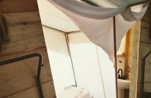 Squires RV Rental | Lovely Safari Tent with Treetop Views for Family Glamping in Missouri