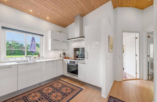 Øhuse House | Lovely thatched holiday home with spa and sauna.