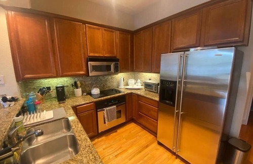 The Galleria Apartment | Lovely two bedroom condo with treetop views