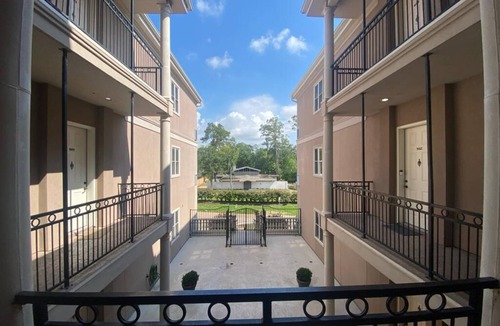 The Galleria Apartment | Lovely two bedroom condo with treetop views