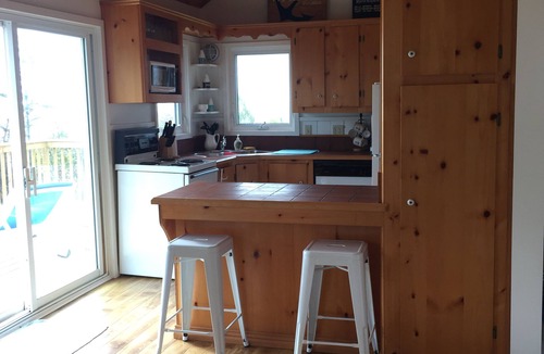 Souris Cottage | Lovely waterfront cottage on private white sand beach