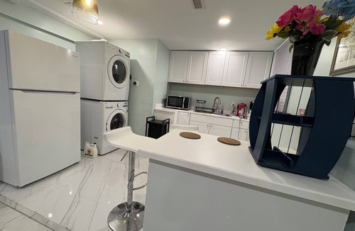 Watertown Apartment | Lower-level, a Double bed, shared bath & kitchen