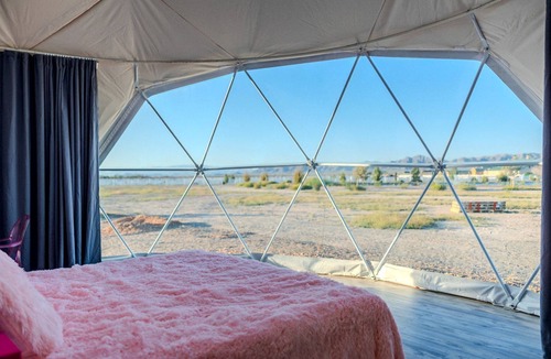 Willcox Cabin | Luminous Cozy Dome with a Barbie Collection Above Bed in Willcox, Arizona