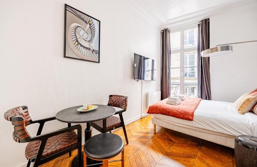 Palais-Royal Apartment | Luminous Studio Oasis Steps from The Louvre