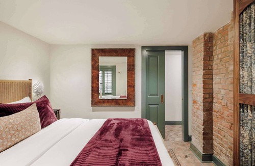 Touro Hotel | Lush Garden District Units With Shared Heated Pool