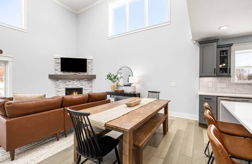 Houghton Lake House | Lux canalfront home. Firepit, kayaks,paddleboat, 20 foot dock, chefs kitchen!