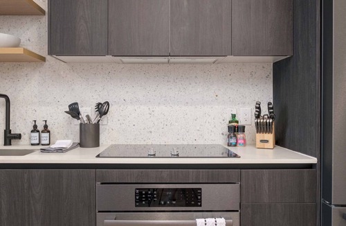 Rainey Street Historic District Condo | Lux Group Stay | Rooftop Pool | #1 Stay on Rainey