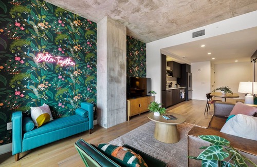 Rainey Street Historic District Condo | Lux Group Stay | Rooftop Pool | #1 Stay on Rainey