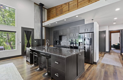 Montgomery House | LUX Modern "Treehouse" on Private Lake - Gameroom, Kayaks, Bunkhouse, more!