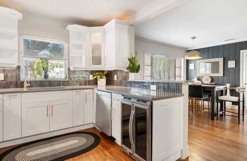 Pinewood Park House | Lux Oasis w/Heated Pool! 5min to Downtown+Beach!