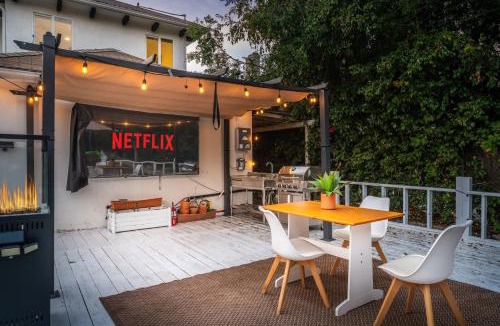 Wilshire House | Luxe 6BR Retreat with Trampoline Swing and BBQ Grill