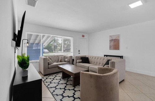 Driftwood House | Luxe Getaway: Poolside Paradise with Game Room