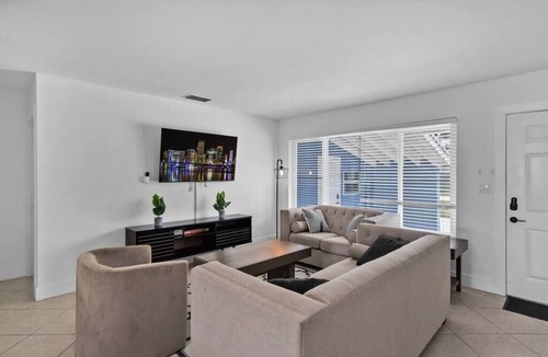 Driftwood House | Luxe Getaway: Poolside Paradise with Game Room