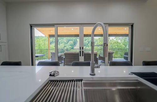 Rogers Apartment | Luxe Lakefront Retreat w/Hot Tub & Game Room