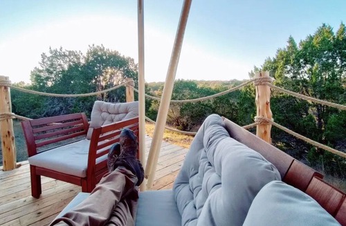 Kempner Cabin | Luxe safari tent + river & exotic wildlife