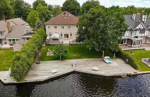 Lagoon City Villa | Luxurious 5 BR/3.5 BA Waterfront Over 5000 SqFt