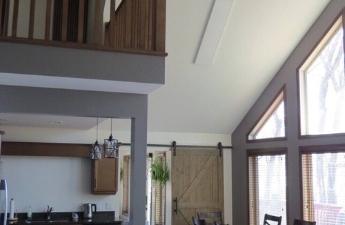 Beaconia Cottage | Luxurious Beach House with lake view. Melt your stress away in the hot tub.