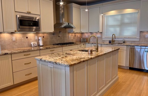 Devon House | Luxurious, Direct Waterfront Home with Private Beach