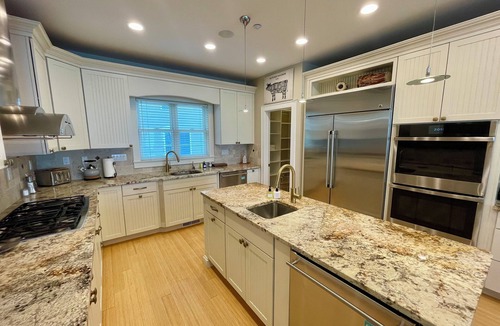 Devon House | Luxurious, Direct Waterfront Home with Private Beach