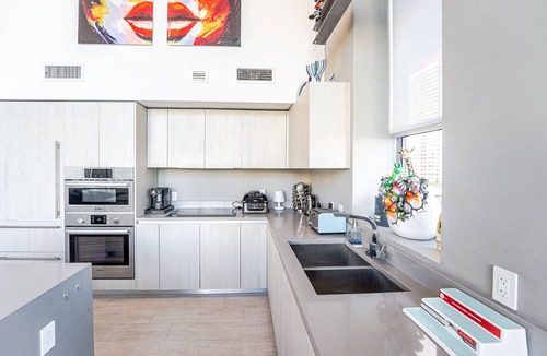 Hollywood South Central Beach Condo | Luxurious Duplex Condo with Beach Service