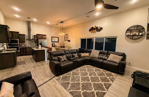 Biggs Field House | Luxurious El Paso Oasis: Modern 5BR, Huge Patio with Kitchen, TV, & Lounge Area