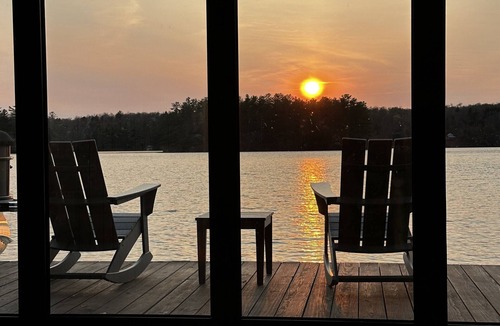 Woodgate House | Luxurious/Modern Adirondack home with gorgeous boathouse, sandbar & sunset view