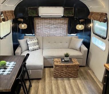 Honey Grove House | Luxurious Remodeled Airstream with Wraparound Deck and Spa near Honey Grove, Texas