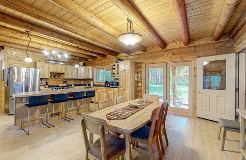 Tillamook Cabin | Luxurious riverfront log cabin with firepit, fireplace, & breathtaking scenery