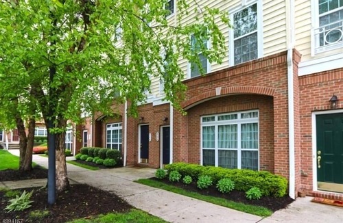 Belleville House | Luxurious townhouse with king suite & living room in a secure gated community.