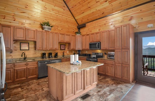 Pigeon Forge Cabin | Luxury 12BR/14BA Cabin w/Indoor Pool, Hot Tub, Arcade, & Theater! Perfect for Family Reunions!